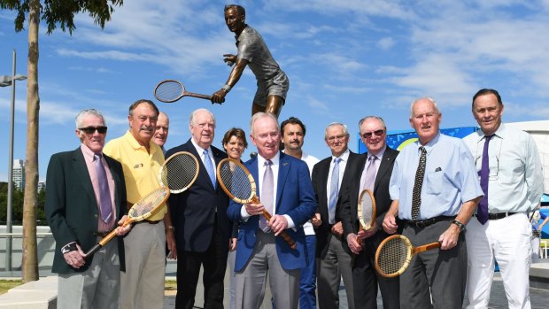 Tennis legends formed a guard of honour for Rod Laver (centre) at the unveiling of his bronze statue.
