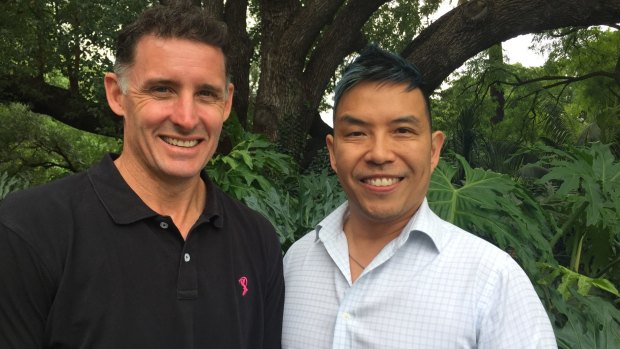 Former Australian cricketer Mike Hussey and interim Men's Health and Wellbeing CEO Simon  Yam.