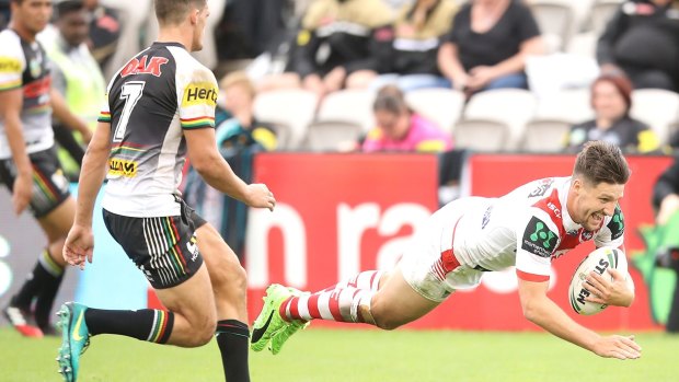 Making hay: Gareth Widdop crosses for another try.