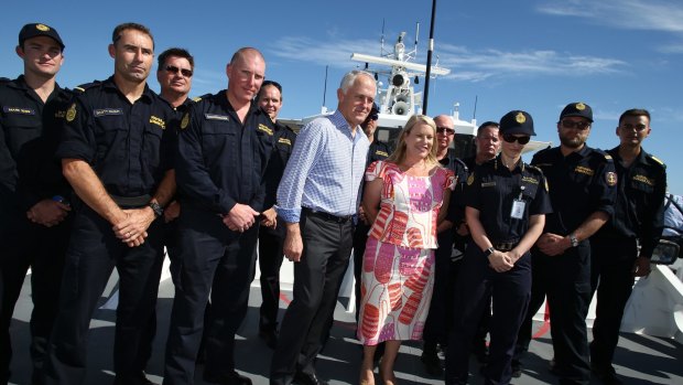 Mr Turnbull with Border Force members and Coalition MP Natasha Griggs.