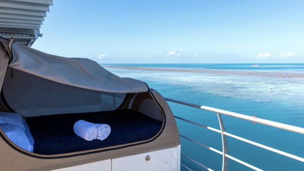 Yopu luxury swag on deck overlooks the Reef.