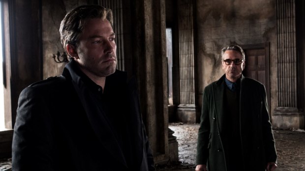 Dark and leaden ... Ben Affleck, left, as Bruce Wayne and Jeremy Irons as Alfred in <i>Batman v Superman: Dawn of Justice</i>.