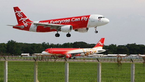 An AirAsia Airbus A320 passenger jet lands at Sukarno-Hatta airport on the outskirts of Jakarta in 2013.