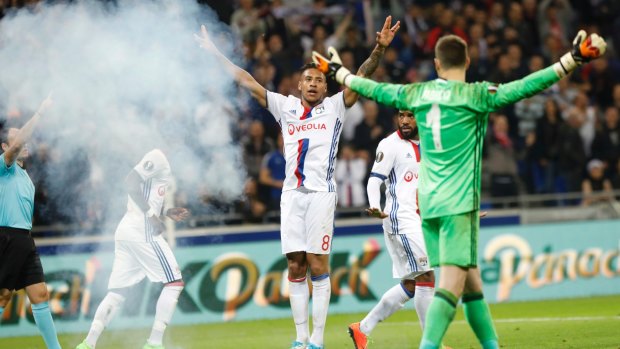 Boiling over: Security at French grounds has been of concern amid recent incidences of fans entering and throwing projectiles onto the field of play.