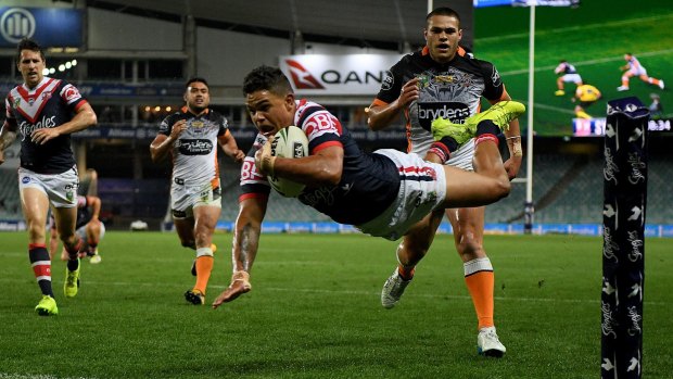 Escape act: Latrell Mitchell scores the match-winner in the 74th minute