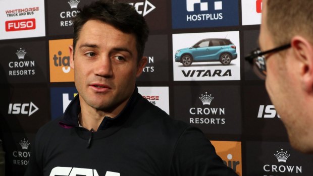 In new colours: Cooper Cronk has joined the Roosters.