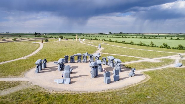 Carhenge, created by Jim Reinders, is a modern replica of England's Stonehenge using old cars and can be found in Nebraska.