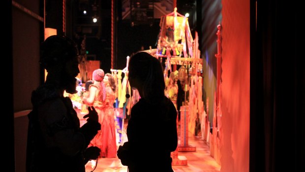 Actors and technical staff wait in the wings of the Sydney show of Aladdin.