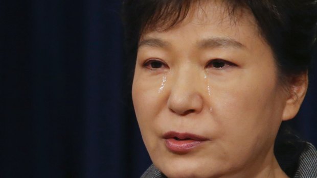 South Korean President Park Geun-hye weeps in May 2014 as she delivers a formal apology to the nation for the state's failure to prevent the ferry disaster.