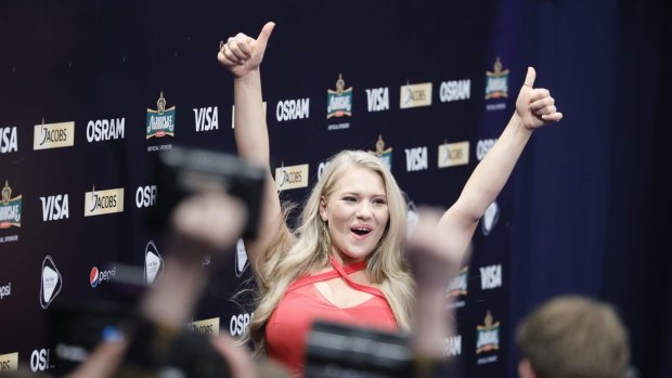 Anja Nissen celebrates making it through to the Eurovision grand final.