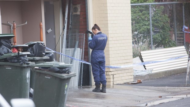 Police forensic photographer at Gelobar in Brunswick East. 