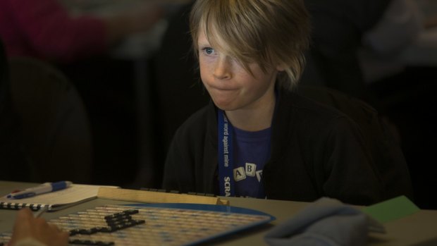 Eight-year-old Ronnie Bennett keeps a firm eye on the competition. Ronnie has twice been under-eight world champion.