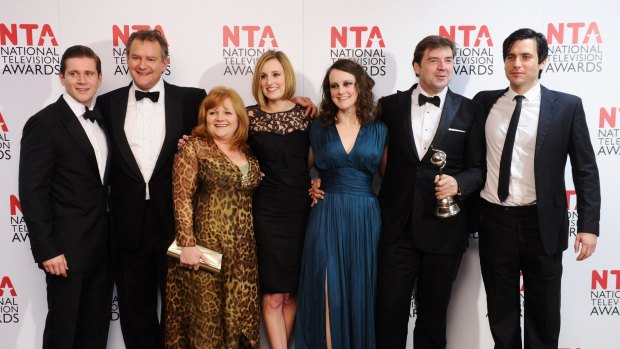Brendan Coyle (second from R) with the cast of <i>Downton Abbey</i> at the National Television Awards 2012 on January 25 in London, England.