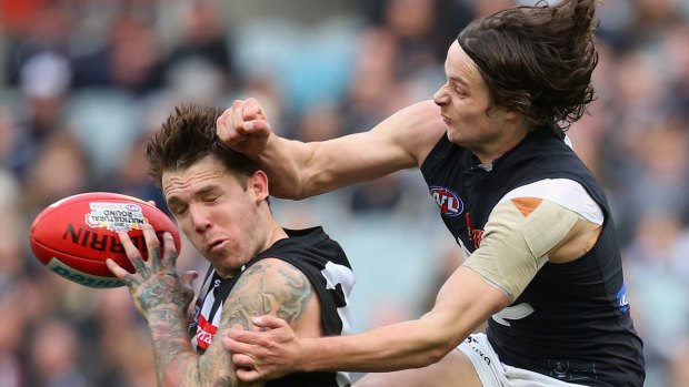 Just a glancing blow: Dane Swan had more than 40 possessions.