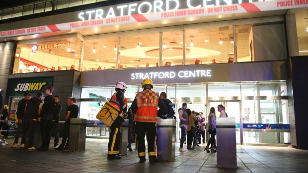 Emergency services personnel at Stratford Centre after the suspected acid attack. 