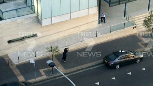 Police take aim at Farhad Jabar after he killed Curtis Cheng outside Parramatta police headquarters.