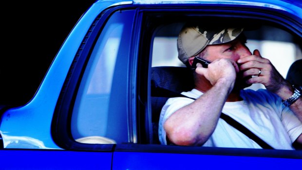 The RACQ has blasted Queensland drivers who use their mobile phones while in their cars.