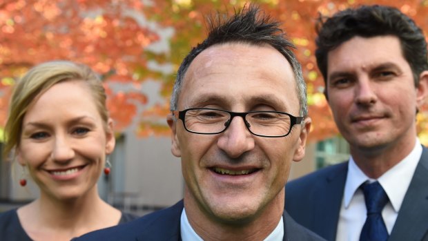 Greens leader Richard Di Natale (centre) has lost two of his senators to dual-citizenship confusion, Larissa Waters and Scott Ludlam. 