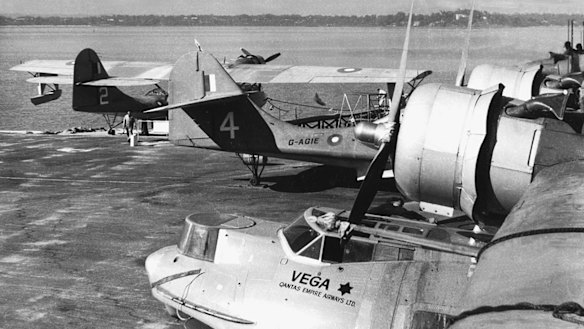 The 'Double Sunrise' Catalinas being serviced on the ramp at Nedlands on the Swan River, with Vega Star in the foreground.