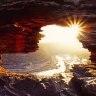 Rock stars ... sunset over the dramatic Nature's Window formation in the Kalbarri National Park.