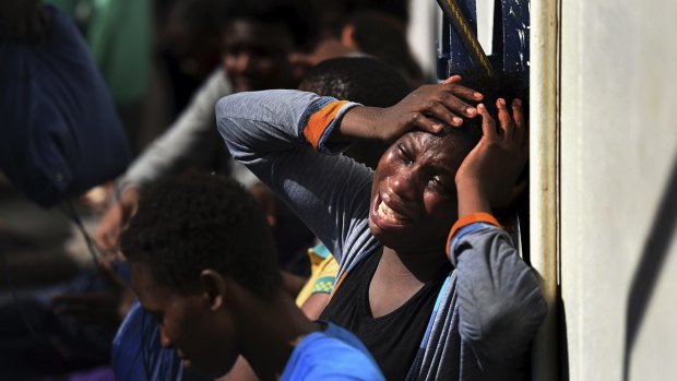 Refugees continue to flood into Europe. Pictured: a woman aboard a European ship after being rescued in the Mediterranean. 