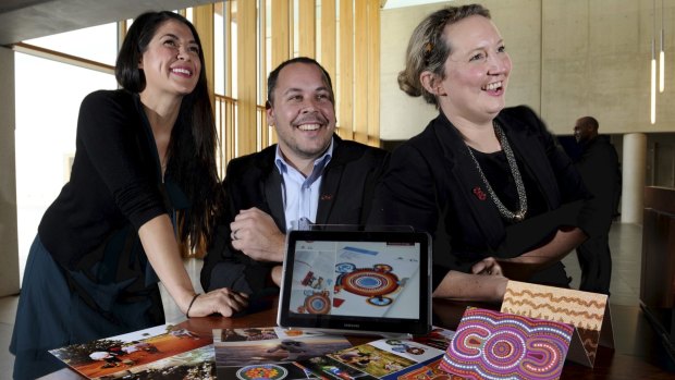 At the National Portrait Gallery, an expo was in progress in
support of the federal government's Indigenous Procurement Policy.
Stallholder Gilimbaa, an Indigenous creative agency, had three of
its management on hand to answer questions. From left, Monique Proud,
project manager, chief executive David Williams and Amanda Lear, managing
director. 
