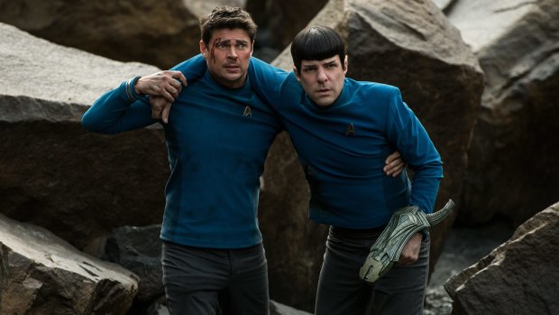 Karl Urban portrays Bones, left, and Zachary Quinto portrays Spock in a scene from <i>Star Trek Beyond</i>.
