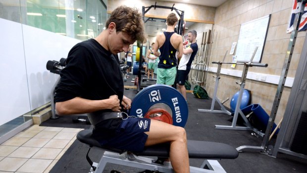 Cameron McEvoy works out in the gym during a training camp at the Manchester.