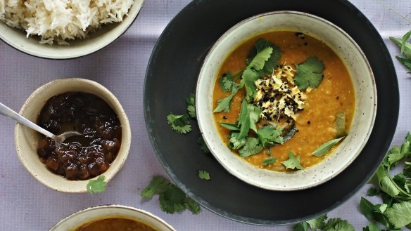 Vegan red lentil curry with chutney and rice.