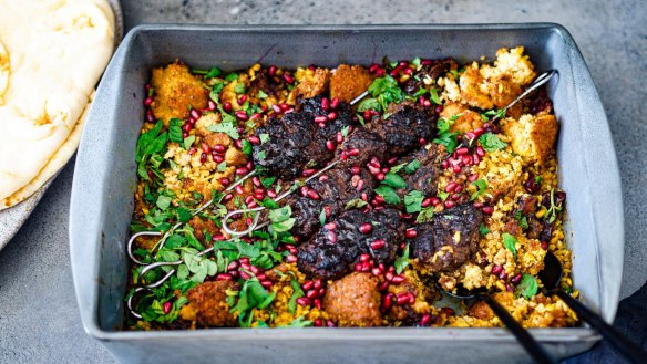 Middle Eastern one-tray wonder with lamb koftas, torn falafel and a bed of dates and grains.
