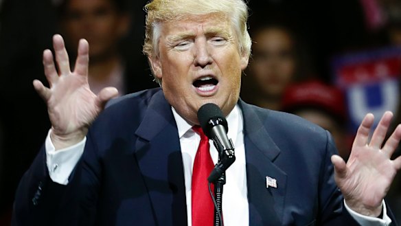 President Donald Trump says construction of the wall will begin within months.