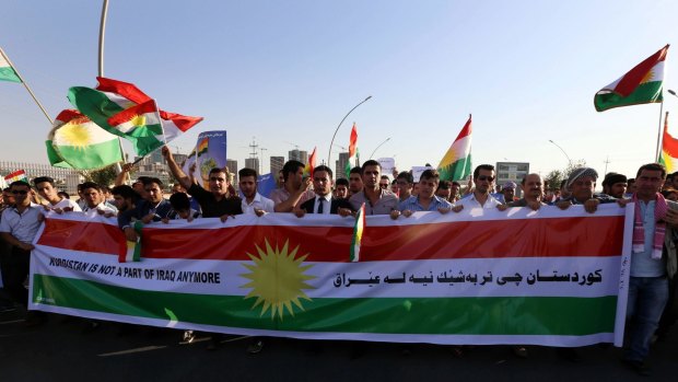 Calls for independence: Iraqi Kurdish demonstrators outside UN offices in Erbil on August 23, 2014. 