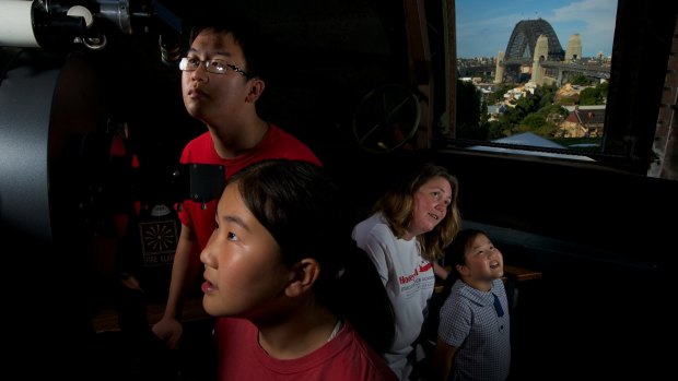 Science obsessed siblings Teddy, 17, and  Ivy,13, have been to space camp in the US organised by their teacher Jackie Slaviero. Youngest sibling Emily, 9, pictured at Sydney Observatory, will soon join them. 