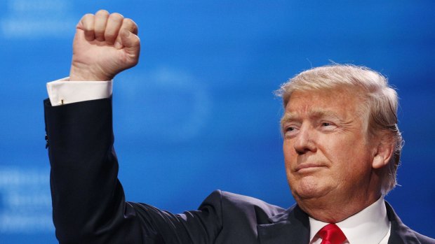 US President Donald Trump gestures after speaking