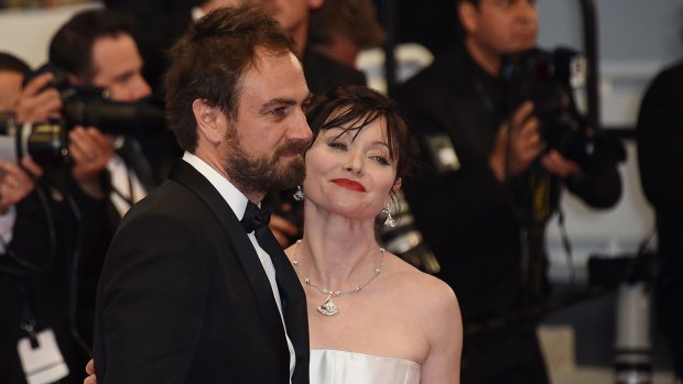 Australian director Justin Kurzel and his wife, actress Essie Davis, leave the gala screening of <i>Macbeth</i> at Cannes.