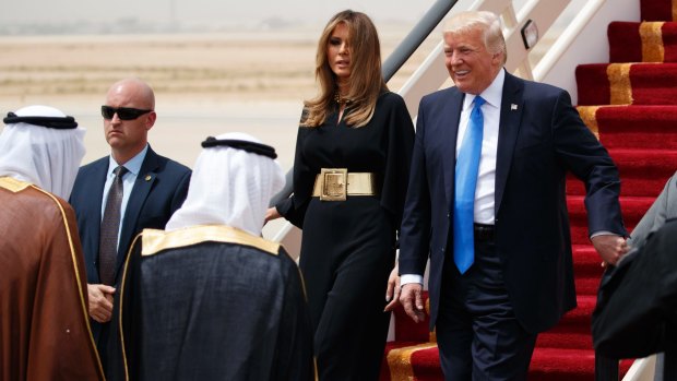 US President Donald Trump and first lady Melania Trump arrive at King Khalid International Airport.