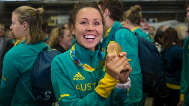 Pleased as punch: Chloe Esposito shows off her gold medal at Sydney Airport on Wednesday morning.