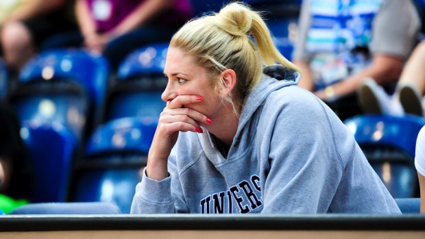 Lauren Jackson watches the Capitals from the sideline last Sunday. She could rejoin the action this weekend.