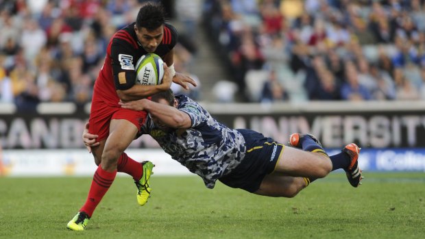 Brumbies' Ben Alexander tackles Crusaders player Richi Mo'Unga. Will the Brumbies fare any better against the Highlanders?
