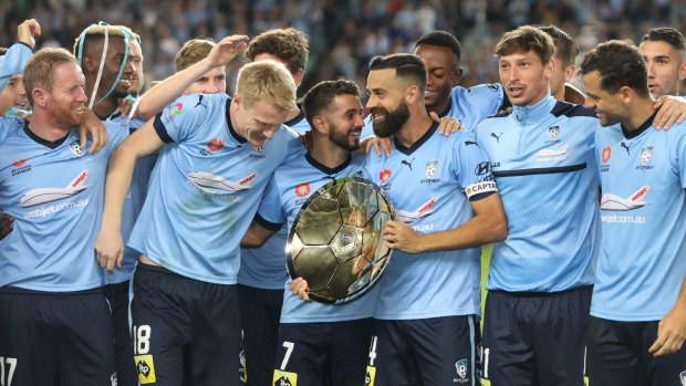 Champions: Sydney FC celebrate with the Premiers' Plate.