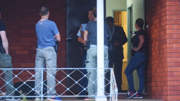 Police conduct raids on properties across Sydney's south-west on Wednesday.