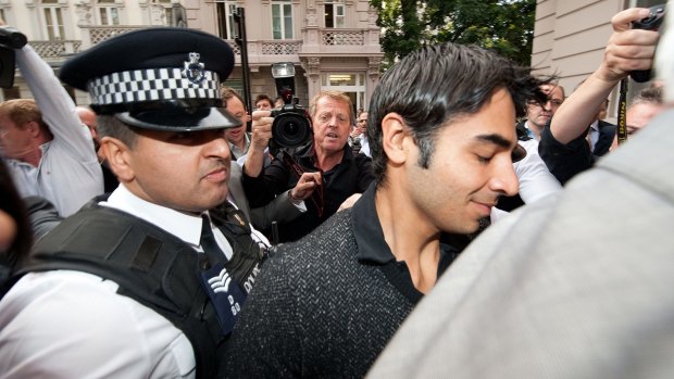 In disgrace: Salman Butt is escorted by police in London in 2010.