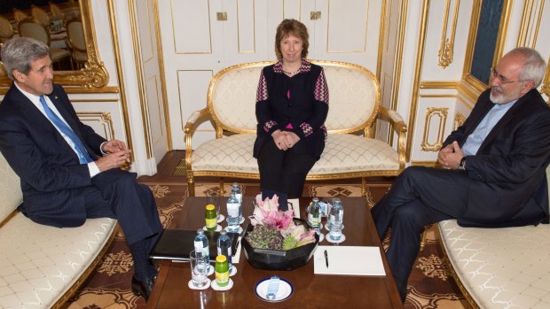 Sideline meeting: US Secretary of State John Kerry, left, former European Union foreign policy chief Catherine Ashton and Iranian Foreign Minister Mohammad Javad Zarif discuss negotiations over Iran's nuclear program.
