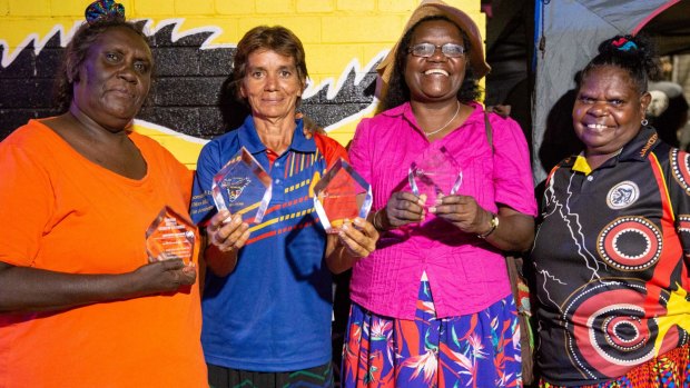 Barunga Festival organising committee members receive awards for a decade of service. From left, Suzina MacDonald, Annemarie Lee and Anita Painter with Lisa Mumbin (far right) of the Jawoyn Association.