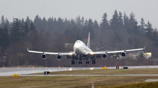 A Boeing 747-400 lands at Paine Field in Everett, Washington on its Delta Airlines farewell tour on Monday. 