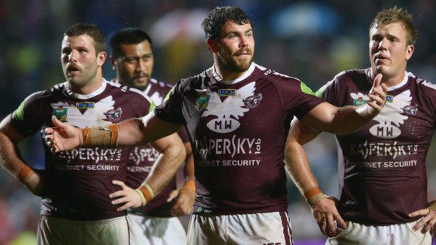 All over: Blake Leary, Josh Starling and Jake Trbojevic of the Sea Eagles look dejected at Brookvale. 