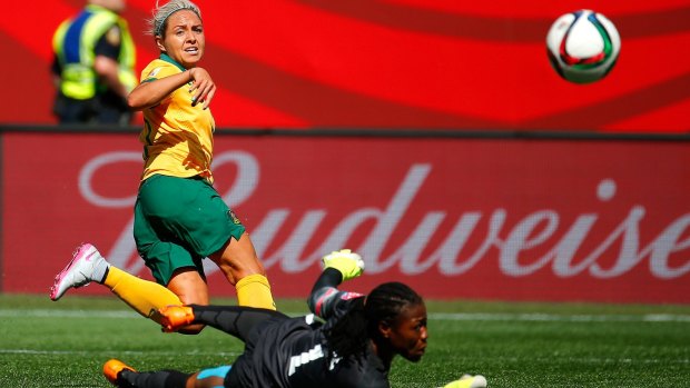 Kyah Simon of Australia scores her first goal.