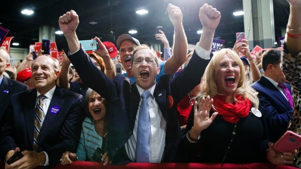 Supporters of Republican presidential candidate Donald Trump cheer.