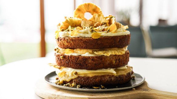 Sunshine on a plate: Hummingbird cake stacked with lemon curd and cream cheese icing, and topped with golden-hued decorations if you're feeling 'extra'.