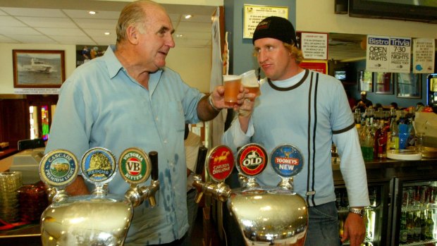 Bill Young behind the bar at The Concord Hotel with his father Bill Young Senior during the Wallabies' end of World Cup recovery session in 2003.